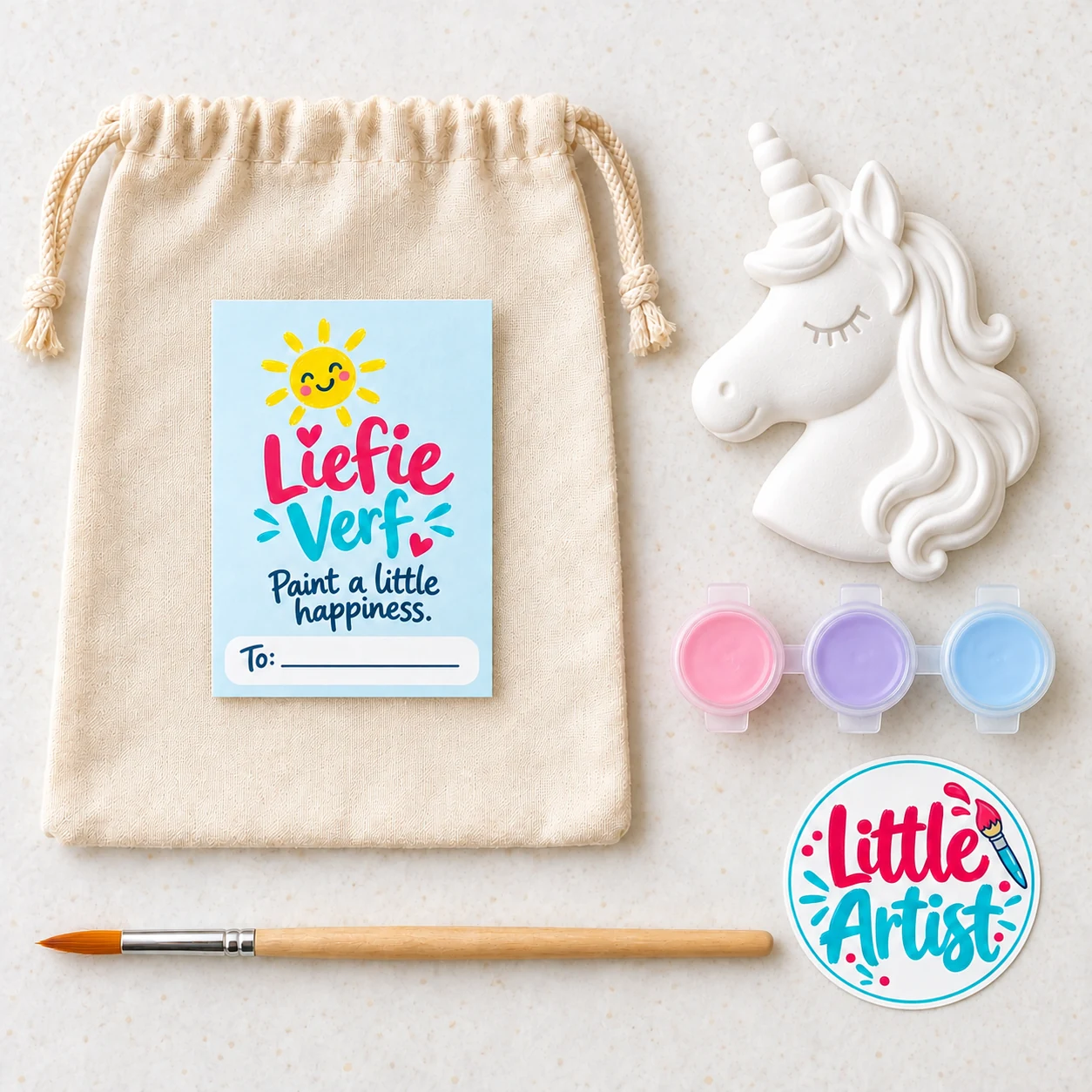 Unicorn paint-your-own party bag with plaster figure, three paint pots, brush, sticker and drawstring bag